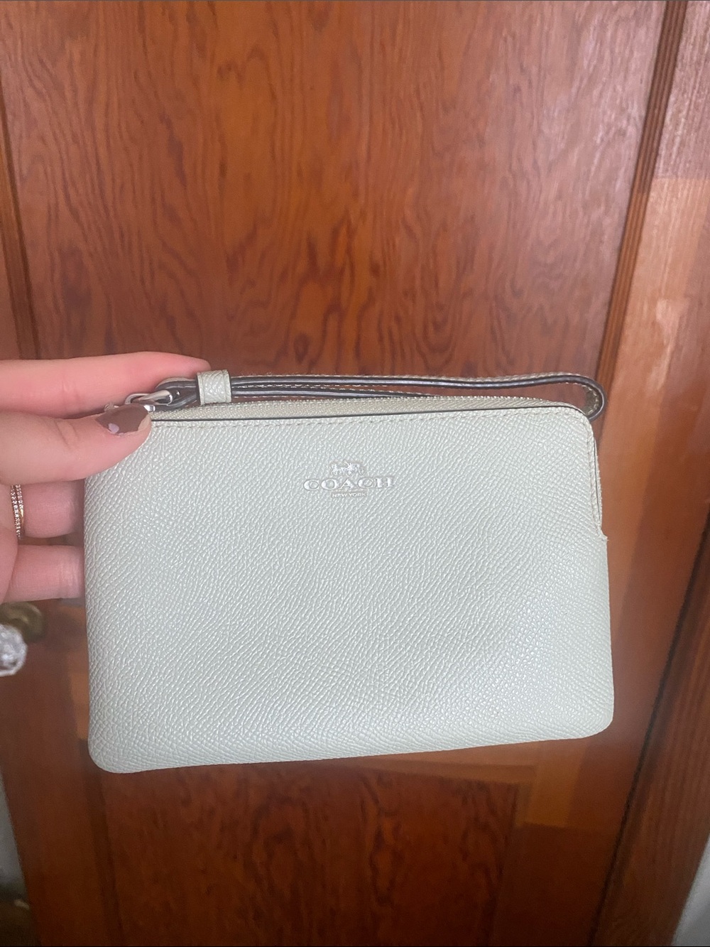 Coach Mint Green Leather Wristlet with Silver Logo
